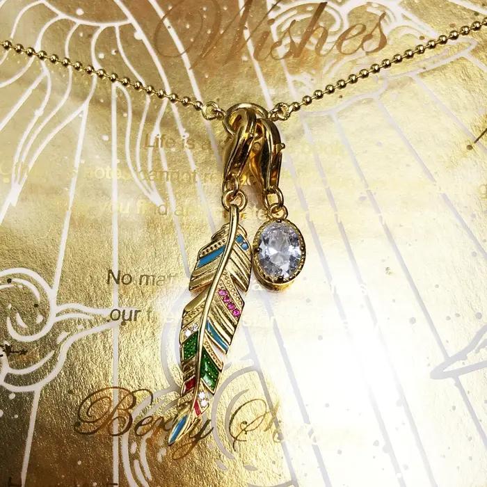 Collier à breloques plume dorée et ovale CZ printemps argent sterling 925 cadeau femme mariage occasions spéciales