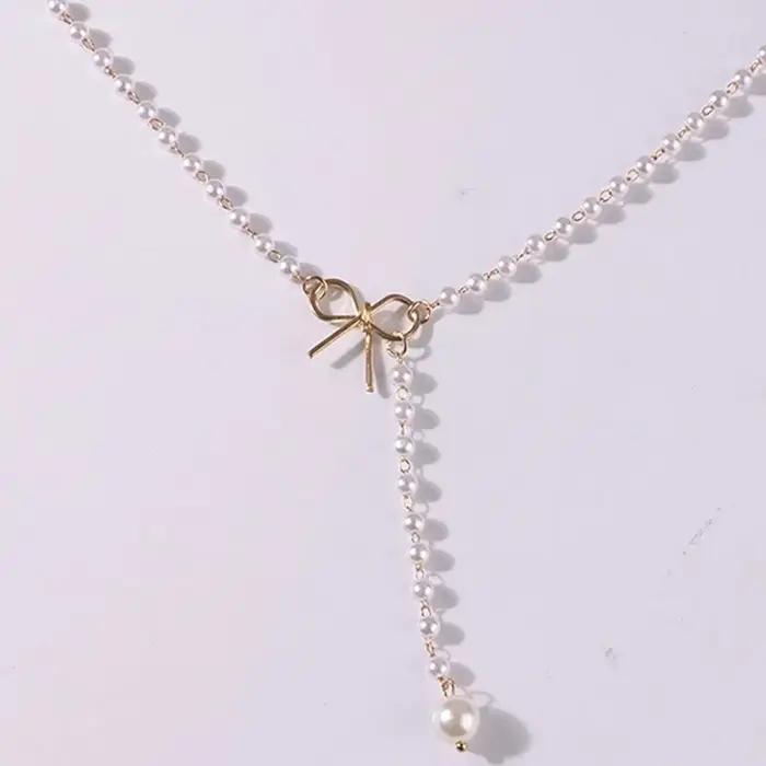 Collier à pampilles en perles noires et blanches pour femmes