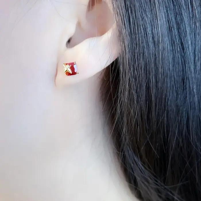 Clous d'oreille Pierre Orange Avec Étoile
