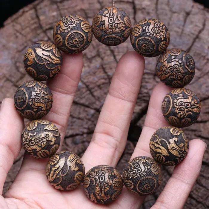 Bracelet en bois naturel sculpté dieu bête richesse