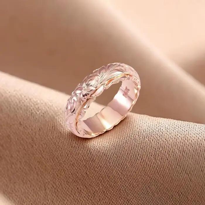 Bague en forme de rose sculptée suspendue de couleur or