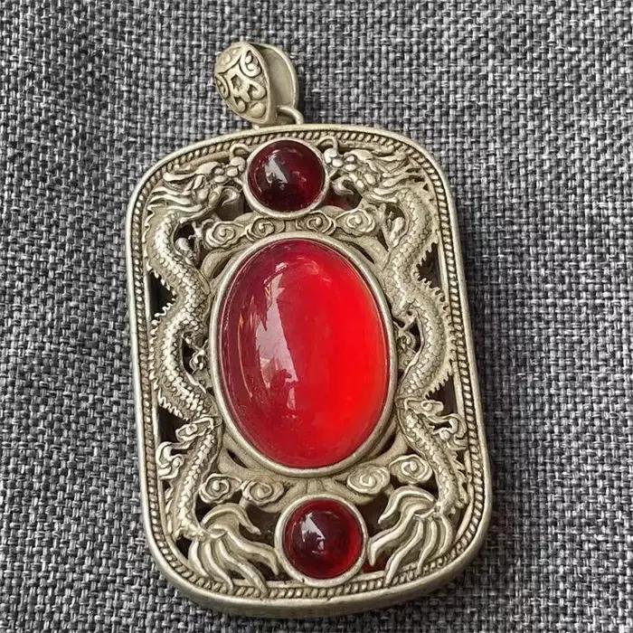Pendentif vintage double dragon ajouré