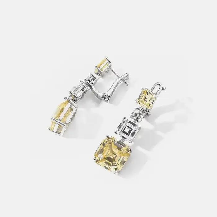 Boucles d'oreilles en argent regardé 100% avec pierres de cone