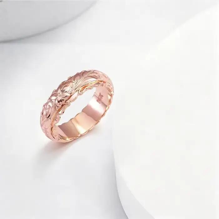 Bague en forme de rose sculptée suspendue de couleur or