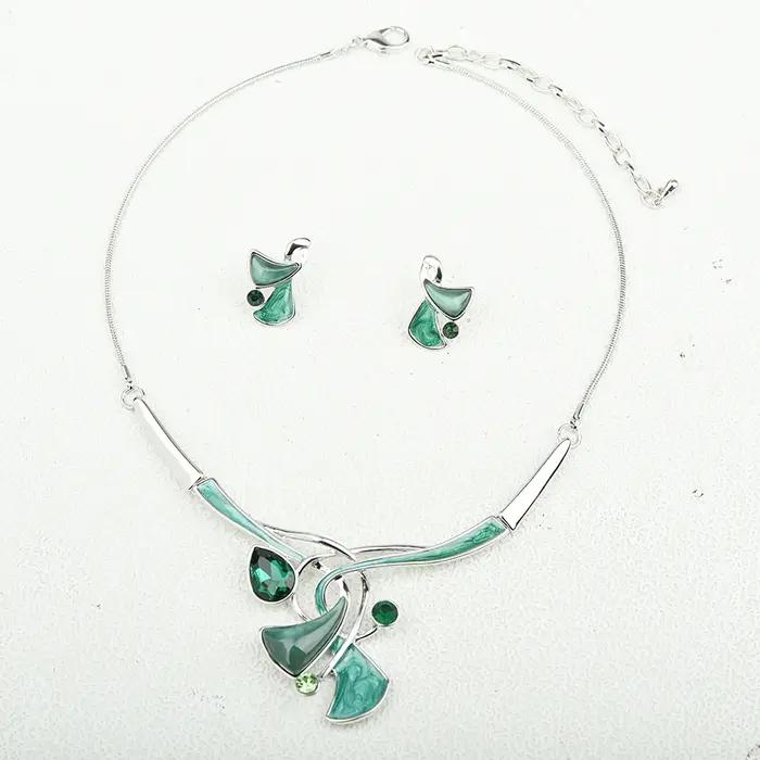 Ensemble de bijoux ICEYY en résine plaquée or pour femmes - Collier et boucles d'oreilles goutte d'eau pour occasions spéciales