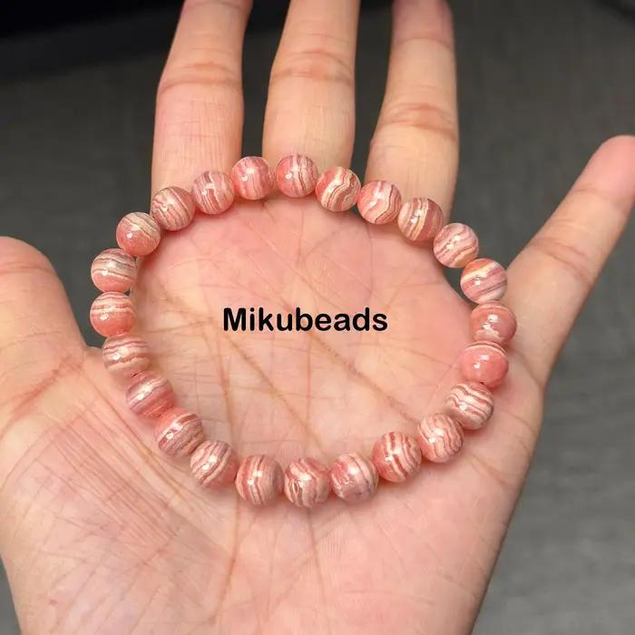 Perles rondes lisses en rhodochrosite naturelle 8-11.5mm 3A