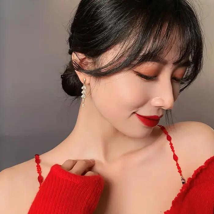 Boucles d'oreilles dorées brillantes en Zircon en forme de feuille pour femmes