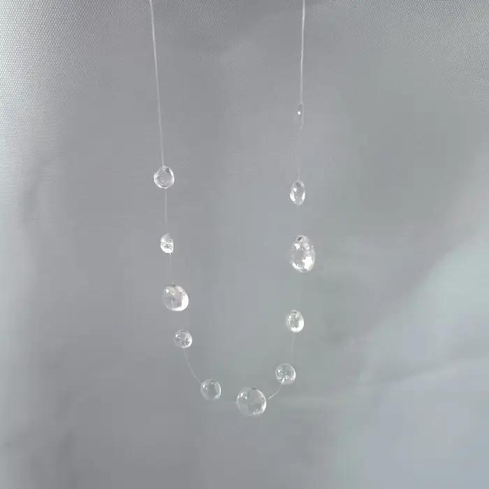 Collier série pompon en forme de goutte de rosée transparente