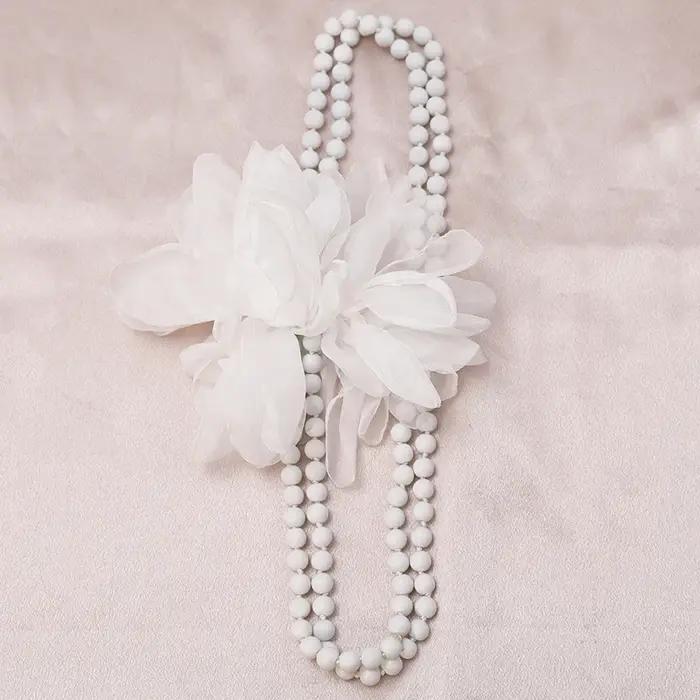 Collier long bohème élégant à grandes fleurs