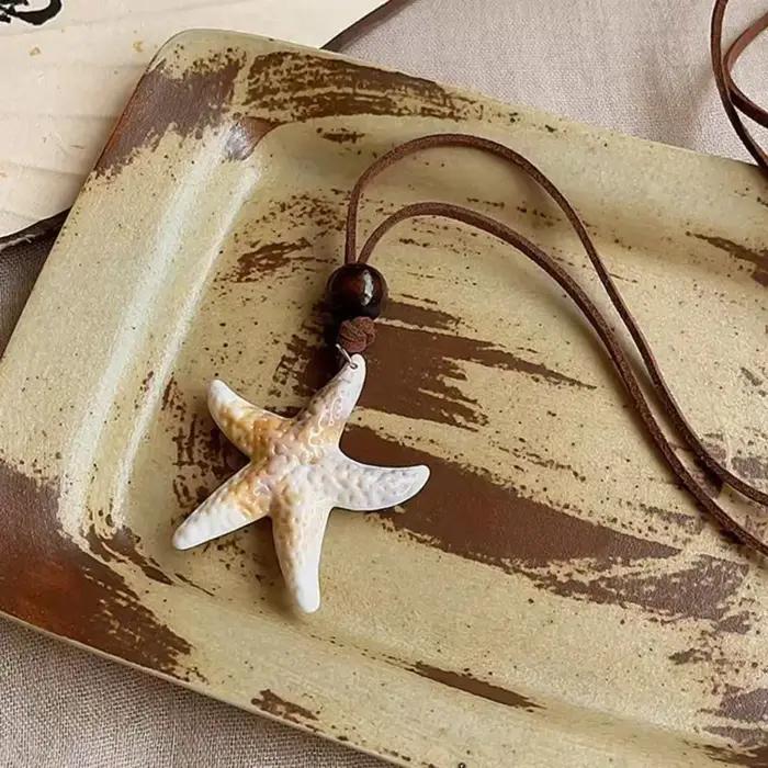 Collier pendentif coquillage style vacances en bord de mer