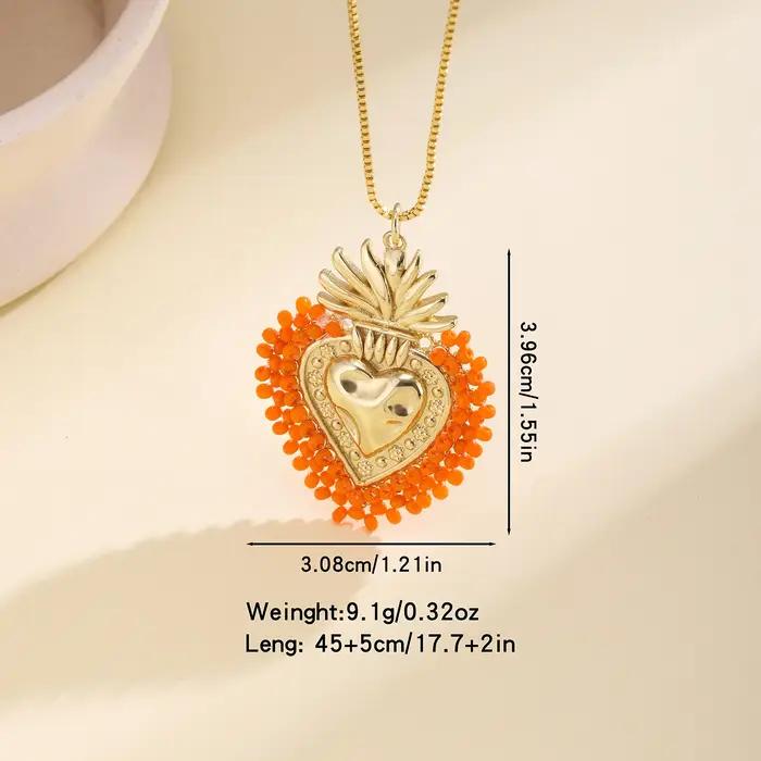 Nidin – collier avec pendentif en forme de cœur sacré