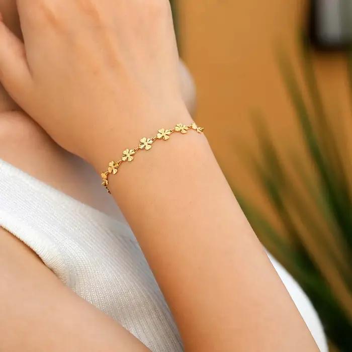 Bracelets à main élégants trèfle à quatre feuilles pour femmes