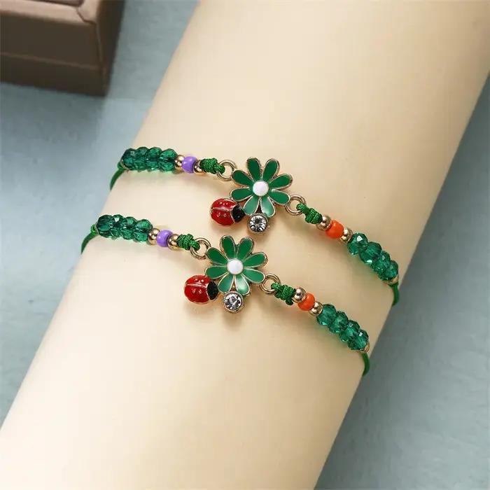 Bracelet tendance et mignon en forme de coccinelle et de marguerite pour femmes