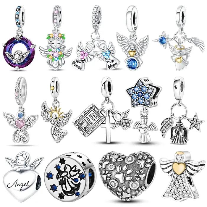 Perles d'aile de pendentif d'ange en argent regardé 925