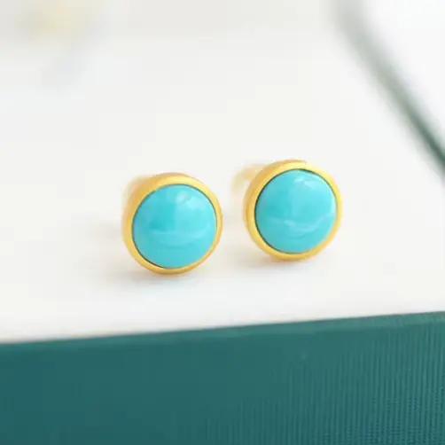 Boucles d'oreilles rondes turquoises incrustées en argent