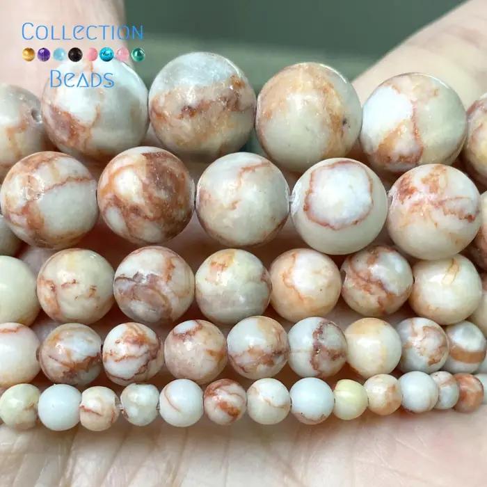 Perles rondes en Rhodonite de toile rouge naturelle