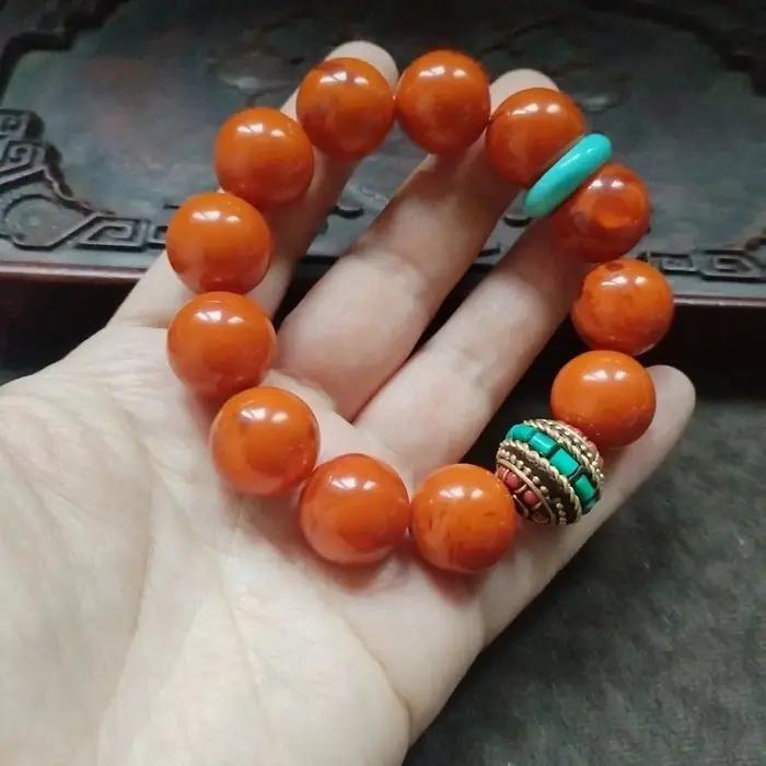 Bracelet de perles rondes orange avec intercalaire turquoise