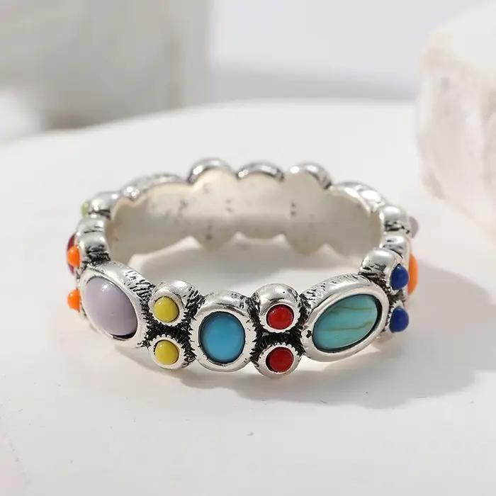 Bague plaquée argent avec pierres synthétiques colorées incrustées