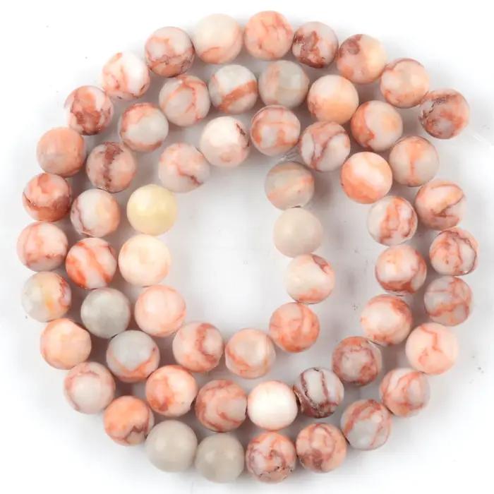 Perles rondes en Rhodonite de toile rouge naturelle