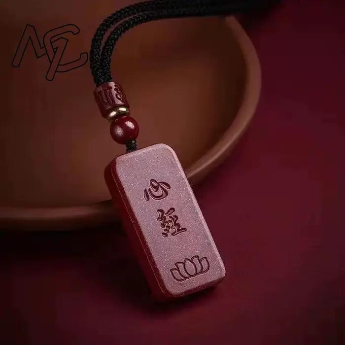Pendentif en cinabre rouge sculpté du Sutra du Cœur Chinois