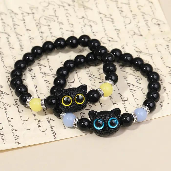 Couple de chat de dessin animé brillant avec paire de bracelets