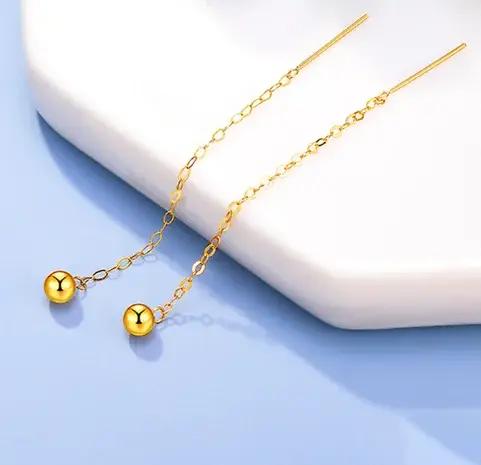 Boucles d'oreilles longues boule en or 18 carats pour femmes