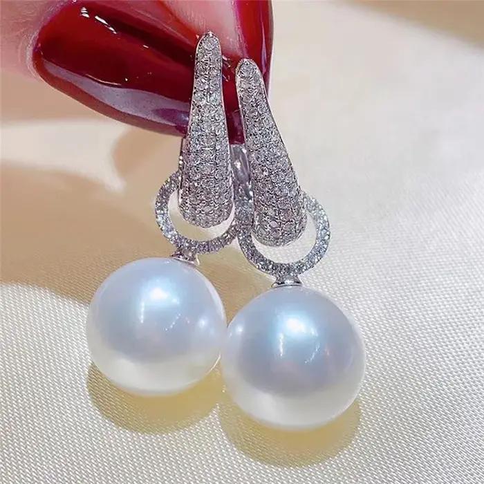Boucles d'oreilles pendantes en zircone cubique scintillante élégantes et modernes pour femmes occasions spéciales