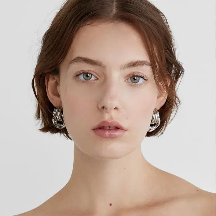 Boucles d'oreilles torsadées multicouches en acier inoxydable plaquées or pour femmes élégantes occasions spéciales mariage soirée chic