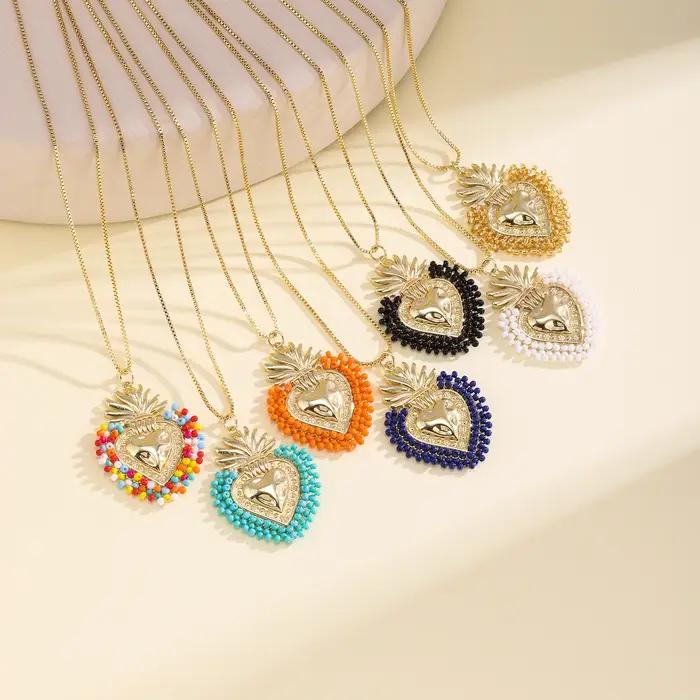Nidin – collier avec pendentif en forme de cœur sacré