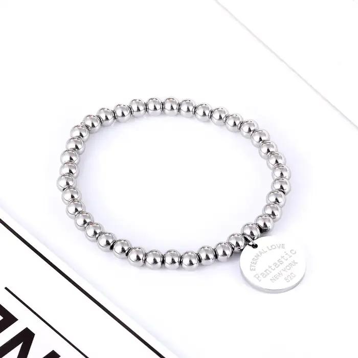 Nouveau Bracelet de perles de corde élastique en acier inoxydable pour femmes, breloque ronde, marqu