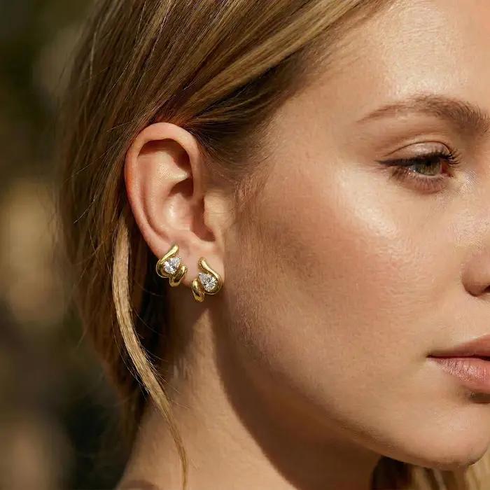 Moonmory – boucles d'oreilles chic en spirale dorée