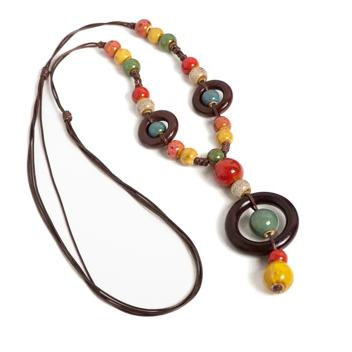 Collier en céramique fait main planète colorée pour femme