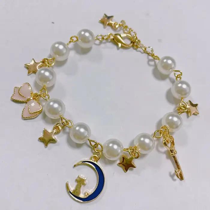 Anime japonais mignon Luna chat sur la lune clé baguette Bracelet à breloques marin lune étoile Bracelet pour femmes filles Cosplay bijoux