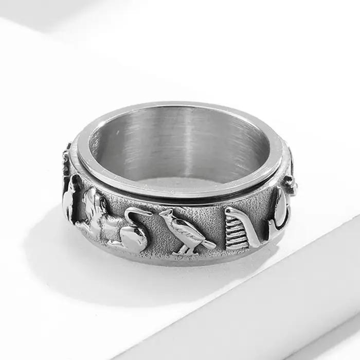 Bague rotative en acier au titane avec motif de belle signification