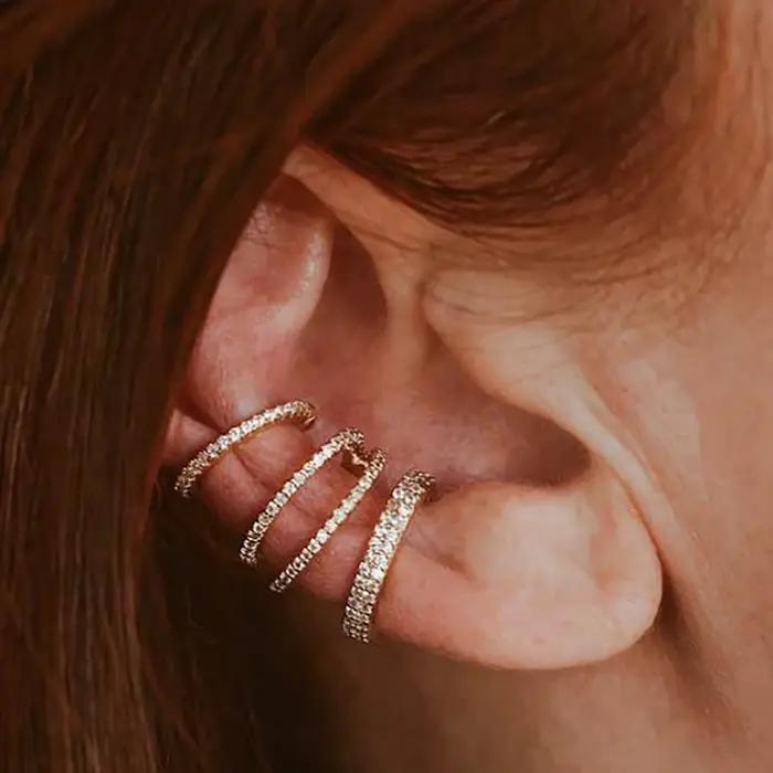 Boucles d'oreilles à clip Crmya en cuivre serties de zirconium cubique élégantes pour femmes occasions spéciales comme anniversaire et mariages