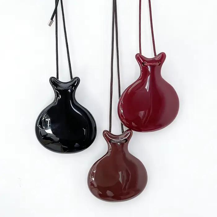 Collier pendentif en résine colorée personnalité à la mode chaîne de pull ronde géométrique corde détachable atmosphère haut de gamme juif...