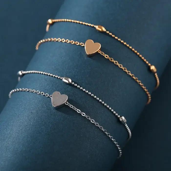 Bracelet de cheville en forme de cœur élégant pour femmes, bijou de cheville en métal or rouge à porter pour diverses occasions spéciales
