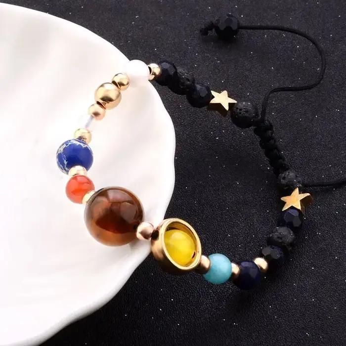 Bracelet Cosmic Galaxy HJUEY en pierre avec gravure de huit planètes pour homme et femme pour célébrer l'univers et l'astronomie occasions spéciales