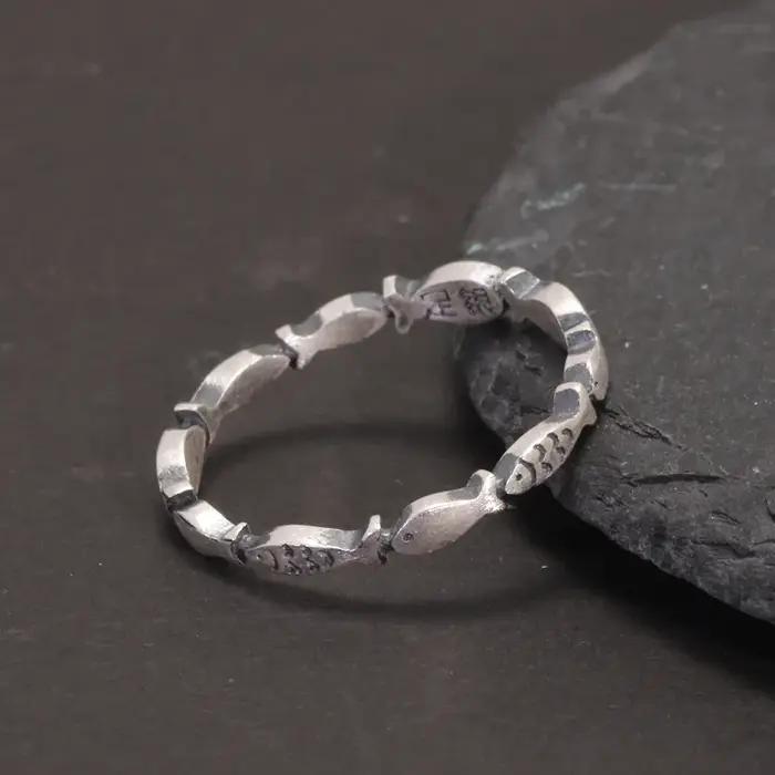 Bague de poisson de natation en argent pur 999