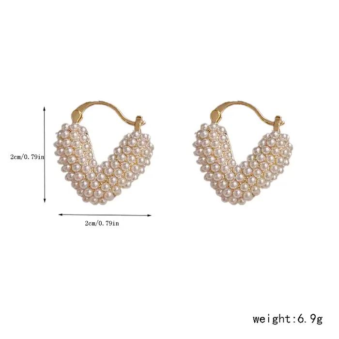 Lumière de luxe Unique nouveau Design amour lmitation perle boucles d'oreilles coeur cerceau boucle d'oreille pour les femmes de mariage bal métal bijoux mode Jewe