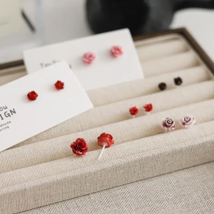 Boucles d'oreilles bio-céramique en résine rouge pour femmes élégantes fleur de rose design minimaliste de luxe vêtements de nuit bijoux amical manchettes d'oreille occasions spéciales