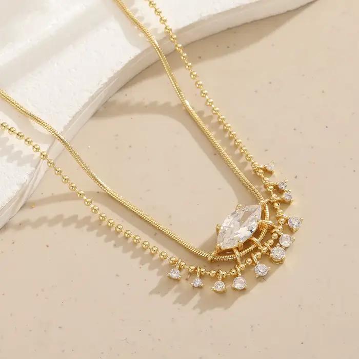 Collier de luxe en cuivre pour femmes avec pierres précieuses artificielles de forme marquise et des