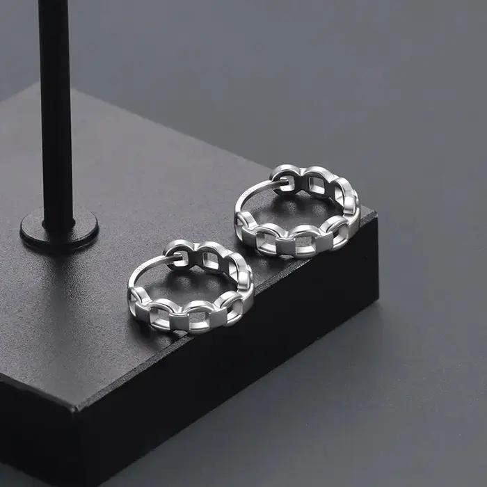 Le nouveau style froid et design de niche en argent S925 tendance 2025 pour les boucles d'oreilles pour hommes et femmes