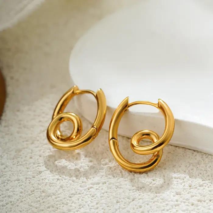 Boucles d'oreilles vortex exquises pour femmes