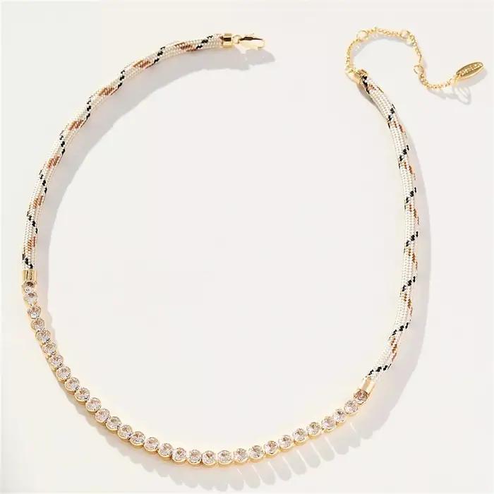 Collier tressé en cuivre plaqué or avec incrustations de diamants artificiels pour femmes occasions spéciales elegance geometrique