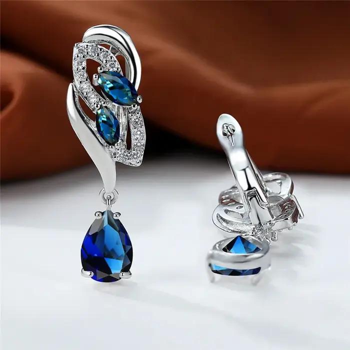 Boucles d'oreilles de luxe en pierre arc-en-ciel bleue pour femmes avec zircon, élégantes et sophistiquées pour occasions spéciales