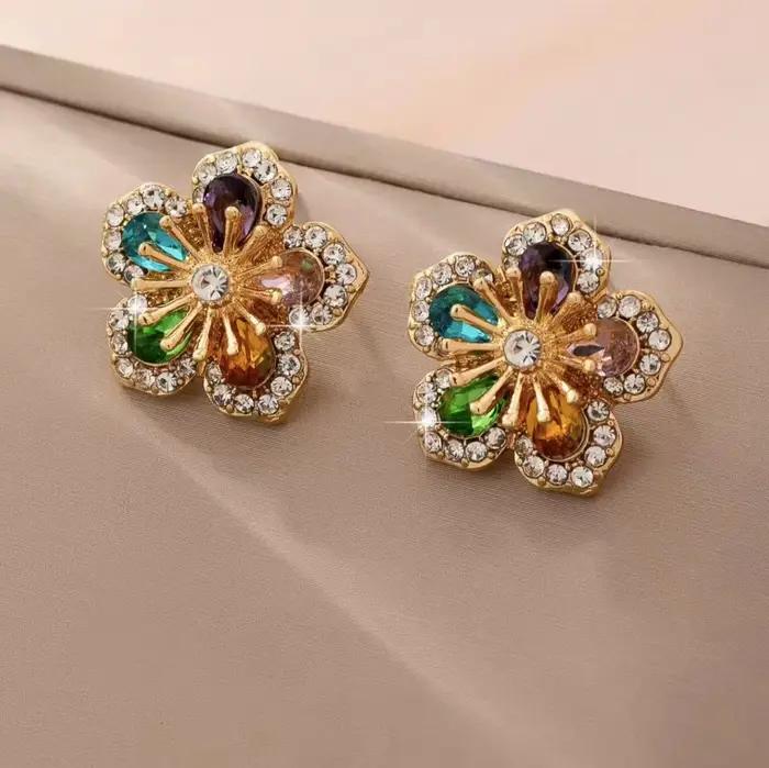 Une paire de boucles d'oreilles florales pour femmes