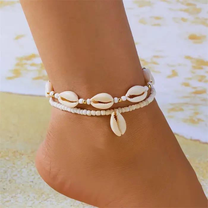 Chevillères en coquillages naturels avec perles en résine pour femmes, chaînes de cheville pieds nus pour été et plage, bijoux de pied élégants et originaux