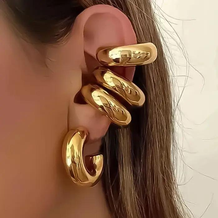 Boucles d'oreilles clip élégantes en or rose plaquées argent pour femmes, style moderne et confortable pour toutes les occasions
