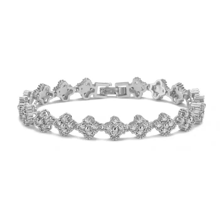 Un bracelet porte-bonheur coloré à fleurs à quatre feuilles incrusté de zircon, style petit parfum luxueux et haut de gamme, polyvalent pour les femmes